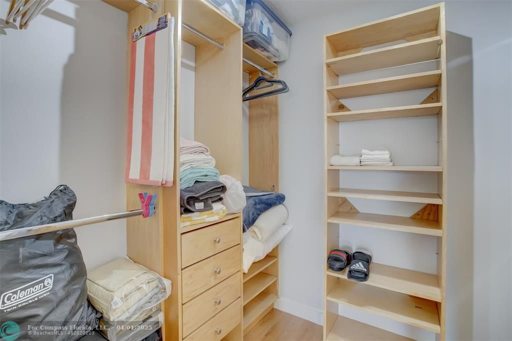 1000 South Ocean Boulevard, Unit 5O Pompano Beach, FL 33062 - Photo 22 of 42 a view of walk in closet with clothes and shoes
