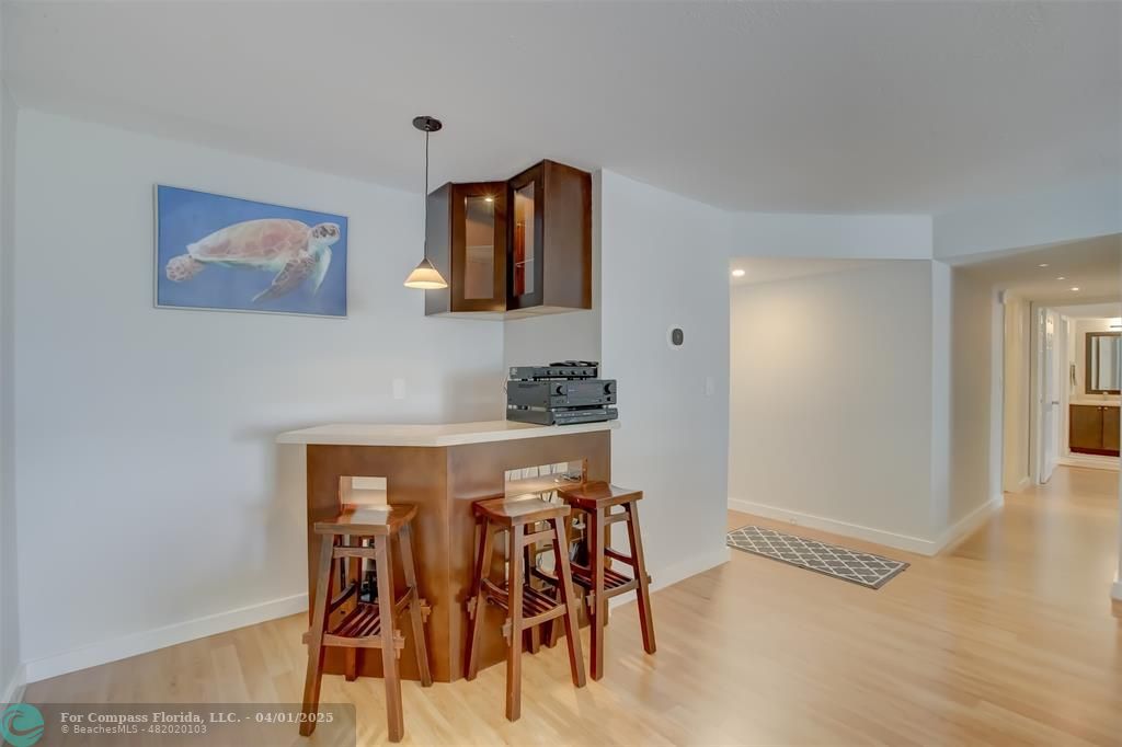1000 South Ocean Boulevard, Unit 5O Pompano Beach, FL 33062 - Photo 27 of 42 a view of a livingroom with furniture and wooden floor