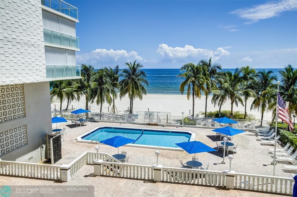 1000 South Ocean Boulevard, Unit 5O Pompano Beach, FL 33062 - Photo 29 of 42 a view of a swimming pool with lounge chair
