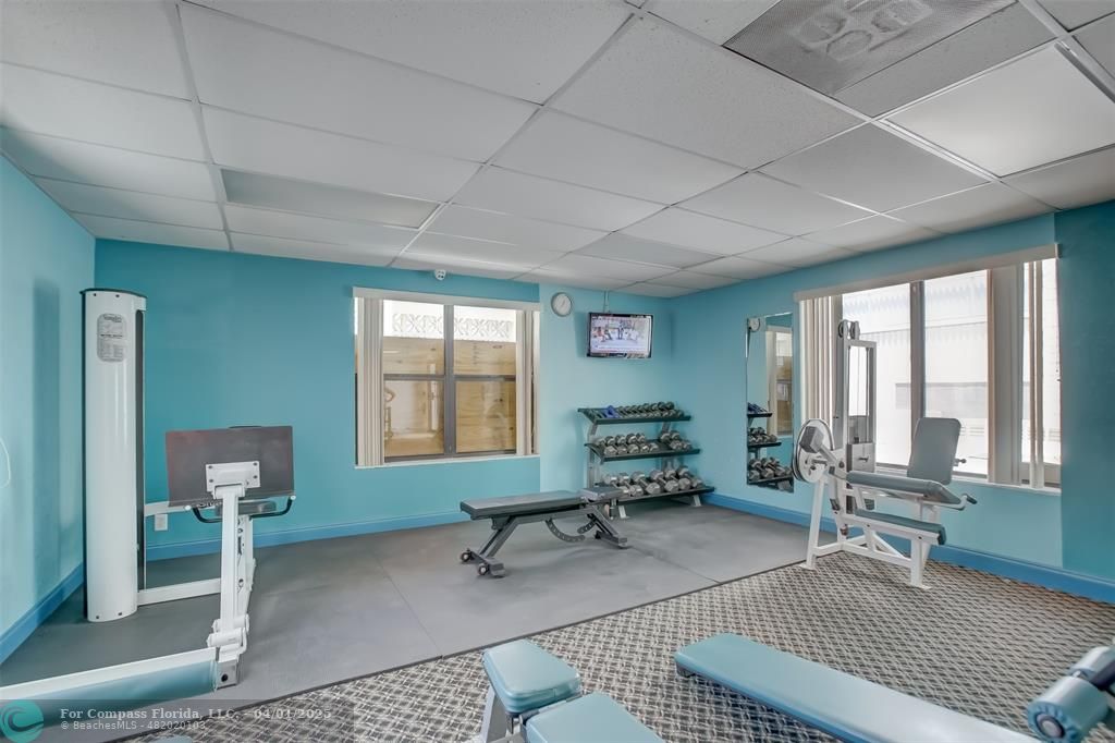 1000 South Ocean Boulevard, Unit 5O Pompano Beach, FL 33062 - Photo 34 of 42 a living room with furniture a window and a table