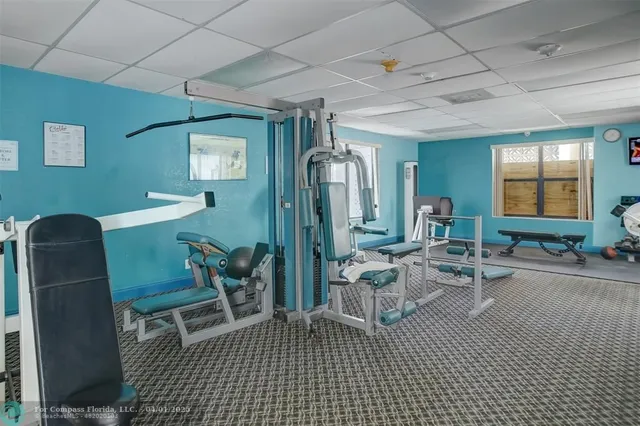 a kitchen with a stove and a sink