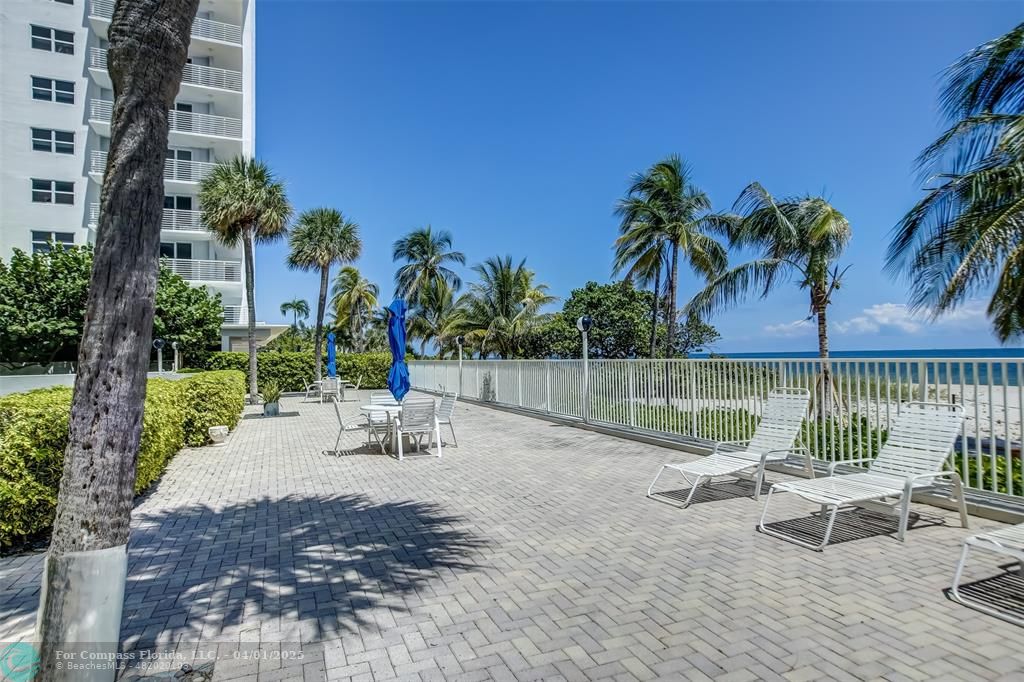 1000 South Ocean Boulevard, Unit 5O Pompano Beach, FL 33062 - Photo 40 of 42 a view of a lake with a table and chairs