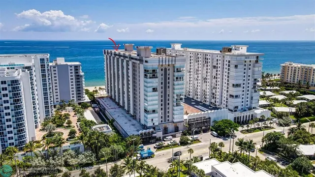 a view of a balcony with wooden floor