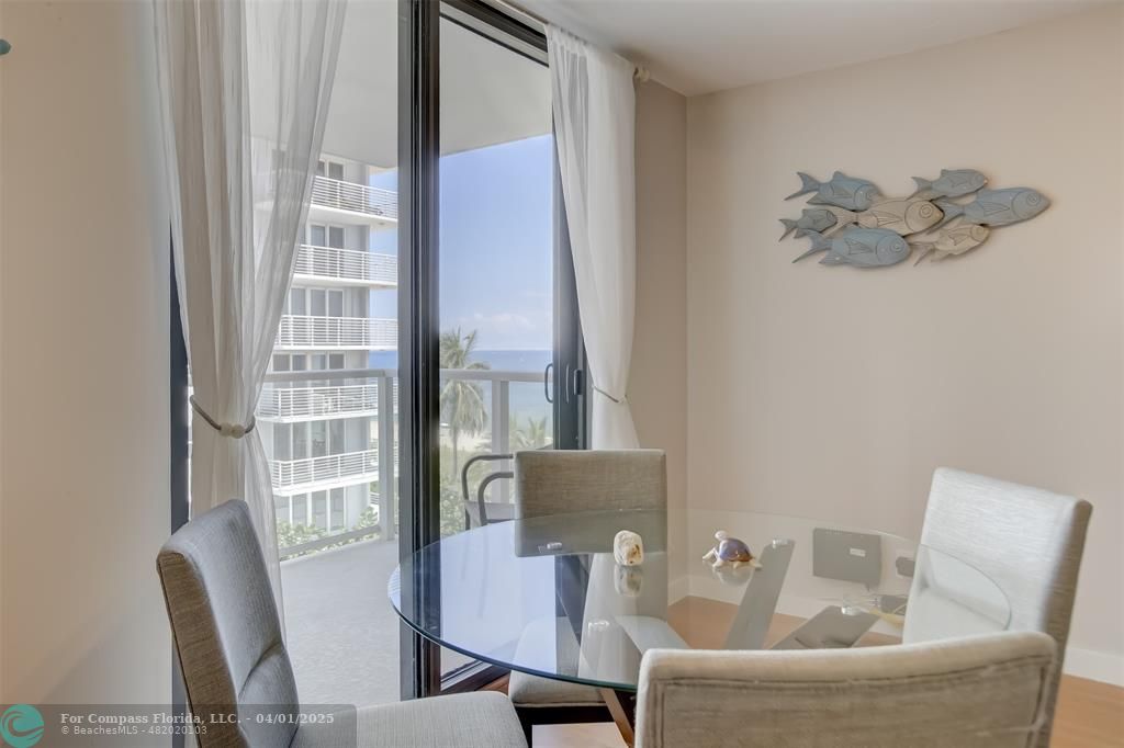 1000 South Ocean Boulevard, Unit 5O Pompano Beach, FL 33062 - Photo 6 of 42 a living room with furniture and a window