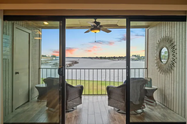 a view of a balcony with furniture