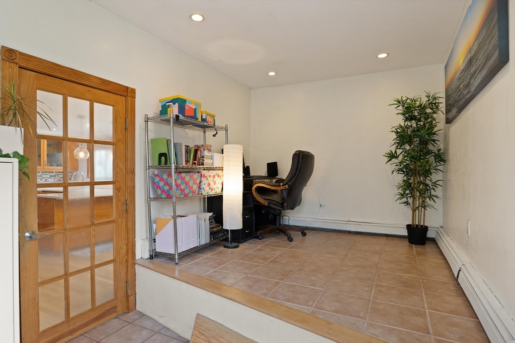 50 Thurston Road, Unit 50 Newton, MA 02464 - Photo 12 of 26 a view of a room with gym equipment