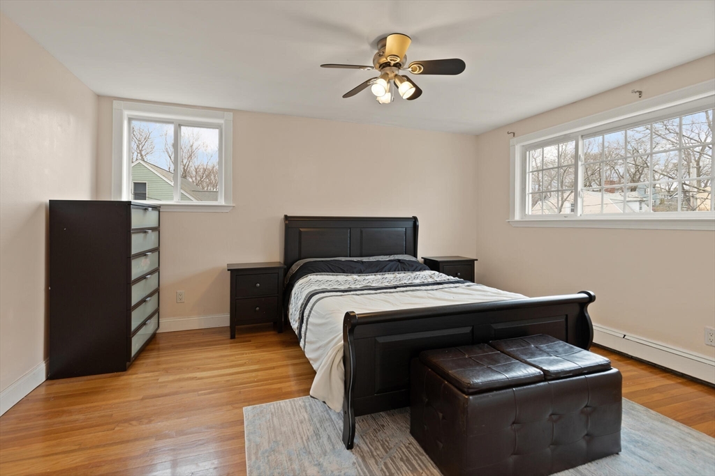 50 Thurston Road, Unit 50 Newton, MA 02464 - Photo 14 of 26 a bedroom with a bed and a window