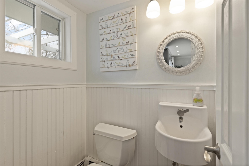 50 Thurston Road, Unit 50 Newton, MA 02464 - Photo 20 of 26 a bathroom with a toilet and a sink