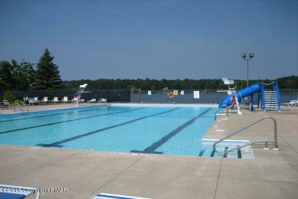 1034 Beaver Run Road Newfoundland, PA 18445 - Photo 17 of 23 a swimming pool with outdoor seating and yard