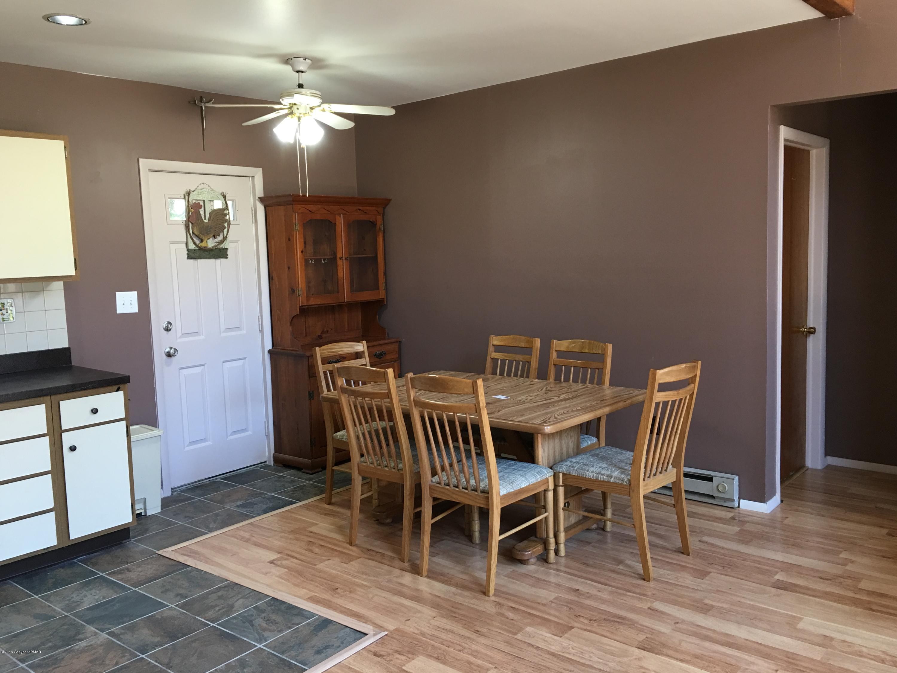 1034 Beaver Run Road Newfoundland, PA 18445 - Photo 5 of 23 a view of a dining room with furniture and wooden floor