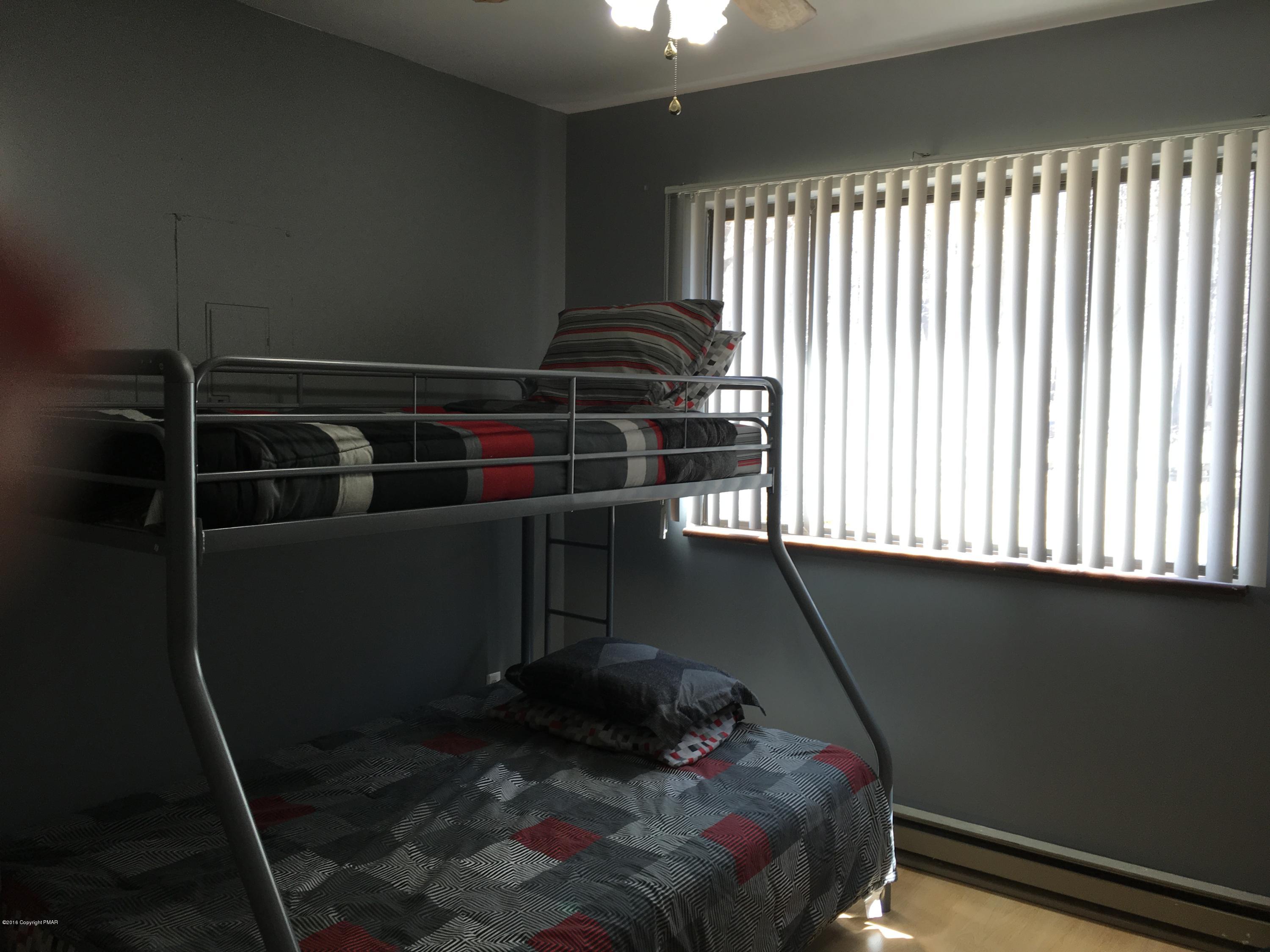 1034 Beaver Run Road Newfoundland, PA 18445 - Photo 9 of 23 a living room with furniture and a window