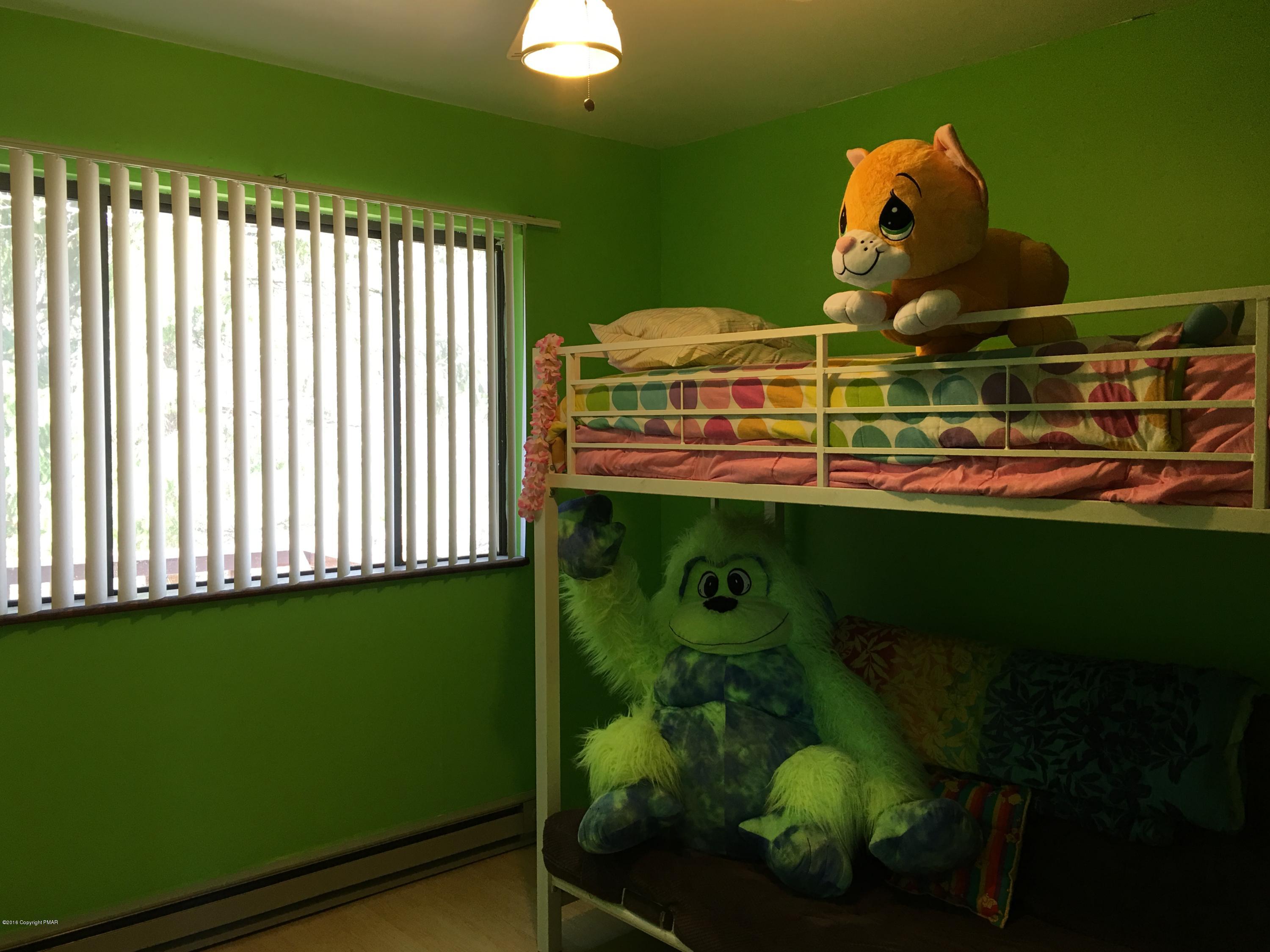 1034 Beaver Run Road Newfoundland, PA 18445 - Photo 10 of 23 a room with cabinets table and chairs