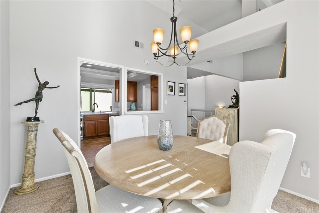 24746 Evening Star Drive, Unit 18 Dana Point, CA 92629 - Photo 13 of 42 a view of a dining room with furniture