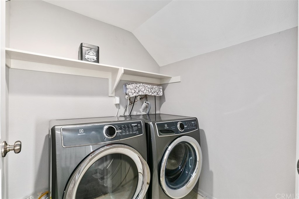 24746 Evening Star Drive, Unit 18 Dana Point, CA 92629 - Photo 27 of 42 a utility room with dryer and washer