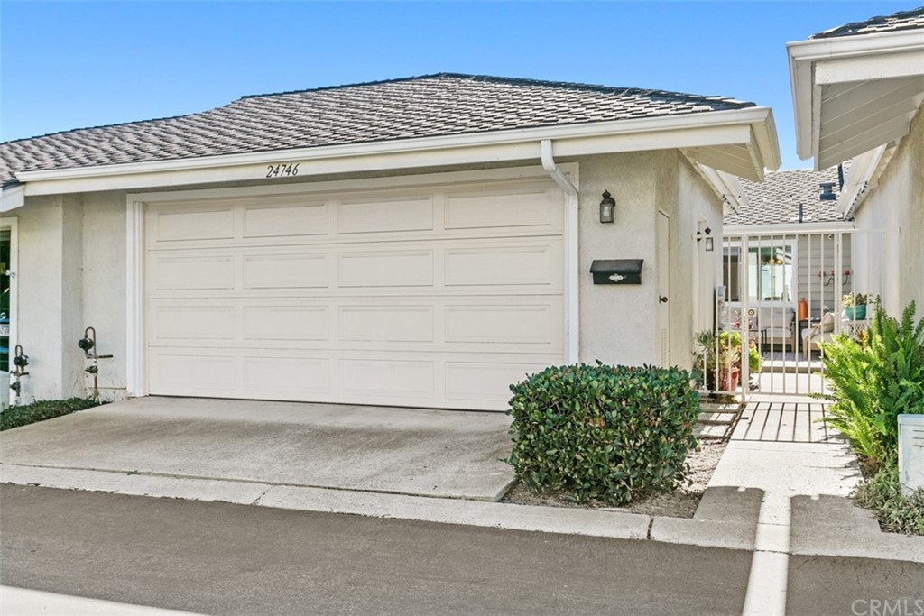 24746 Evening Star Drive, Unit 18 Dana Point, CA 92629 - Photo 3 of 42 a front view of a house