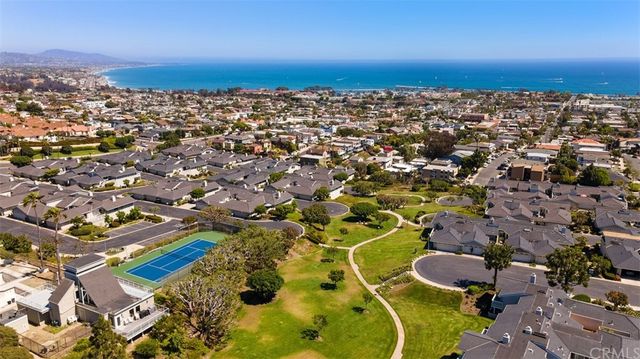 an aerial view of residential building and street