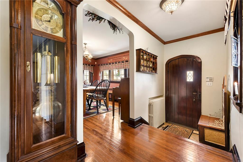 637 East McMurray Road Canonsburg, PA 15317 - Photo 7 of 50 Charming entryway with rich hardwood floors, arched doorway, and original character details that set the tone for the entire home.