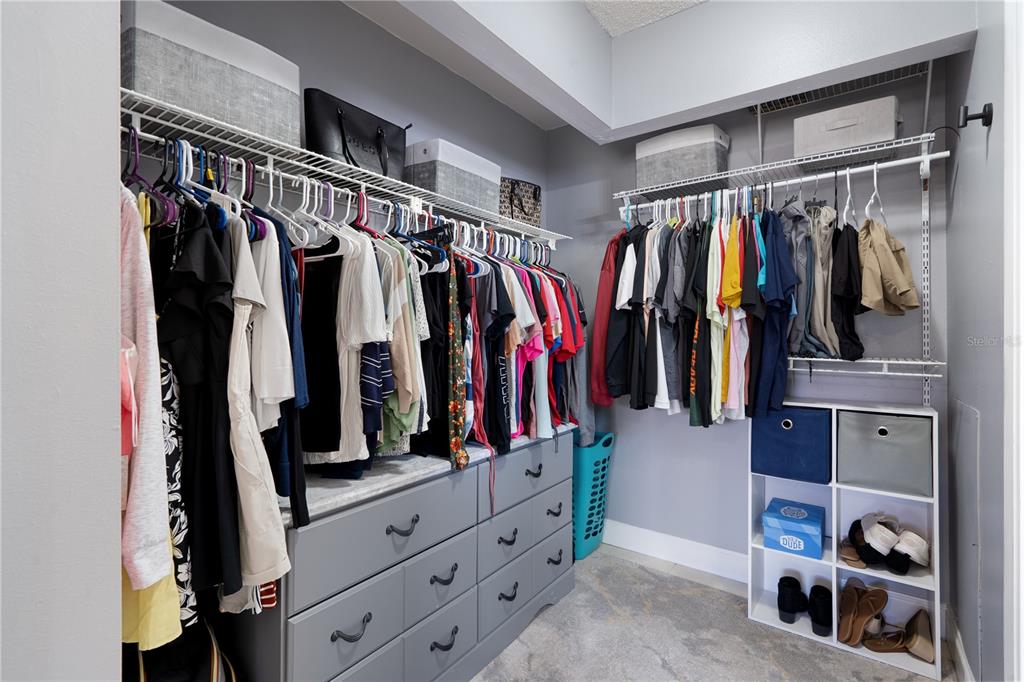 5025 Bromley Avenue Spring Hill, FL 34609 - Photo 22 of 41 a view of walk in closet with clothes and shoes