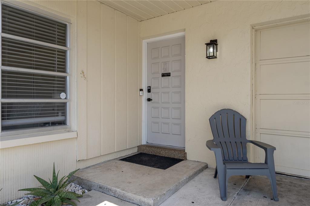 5025 Bromley Avenue Spring Hill, FL 34609 - Photo 3 of 41 a living room with furniture and a potted plant
