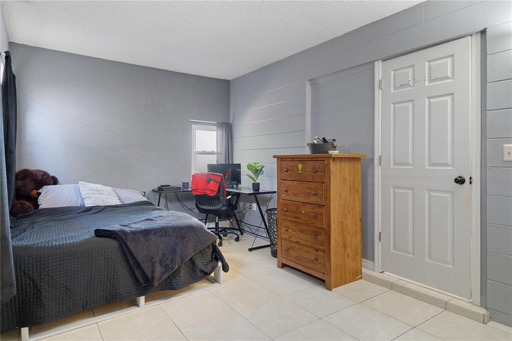 5025 Bromley Avenue Spring Hill, FL 34609 - Photo 32 of 41 a bed room with a bed and a closet