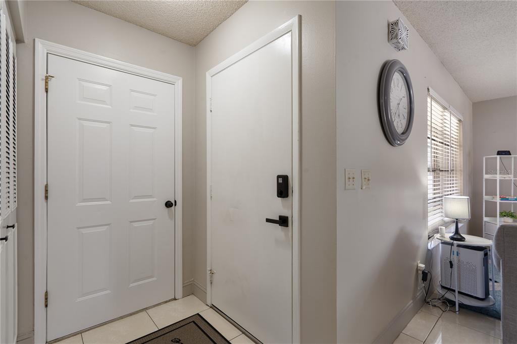 5025 Bromley Avenue Spring Hill, FL 34609 - Photo 5 of 41 a bathroom with a granite countertop shower a mirror and a sink