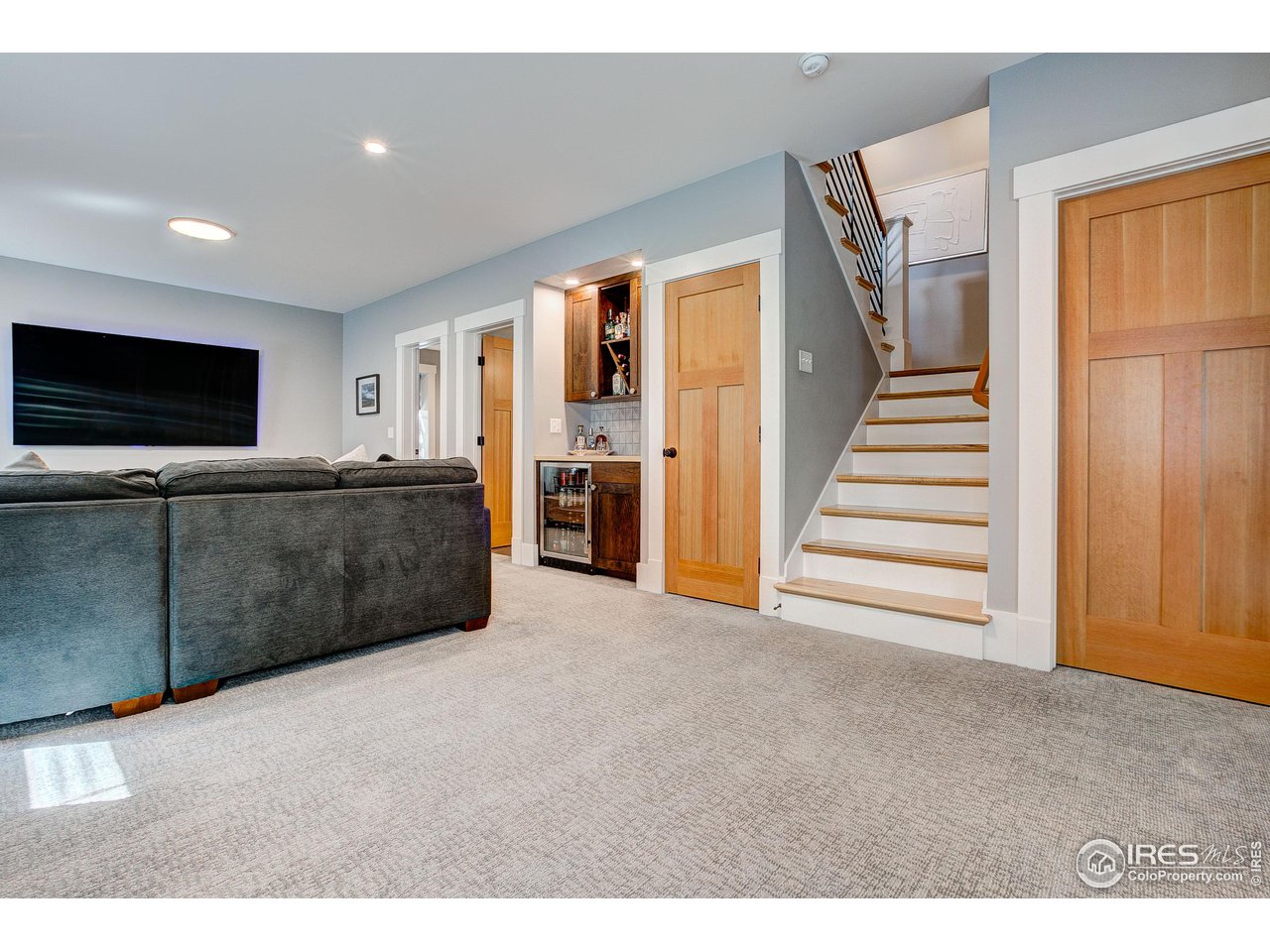 406 North Whitcomb Street Fort Collins, CO 80521 - Photo 21 of 33 a view of a livingroom with furniture and staircase