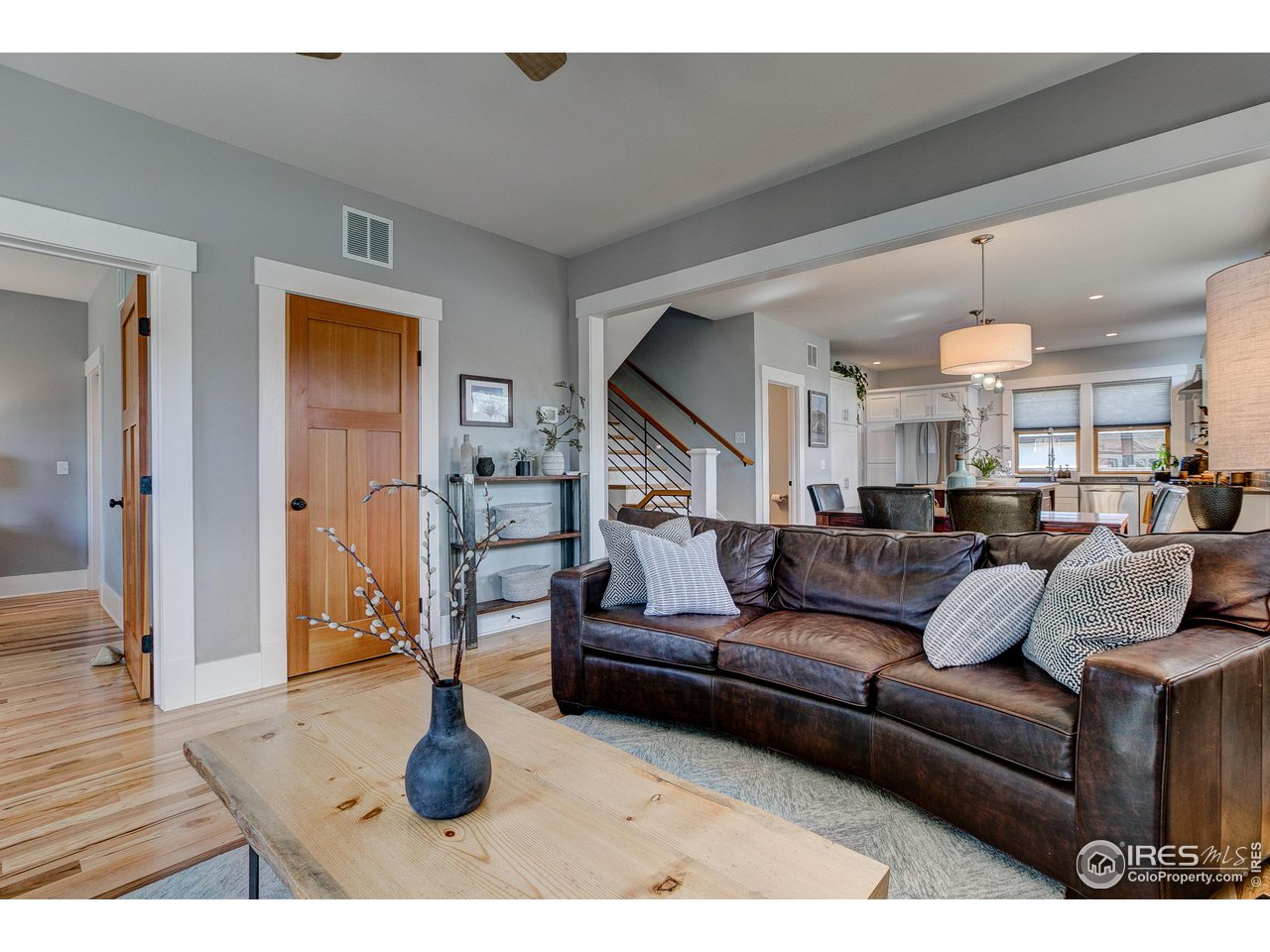 406 North Whitcomb Street Fort Collins, CO 80521 - Photo 5 of 33 a living room with furniture and kitchen view