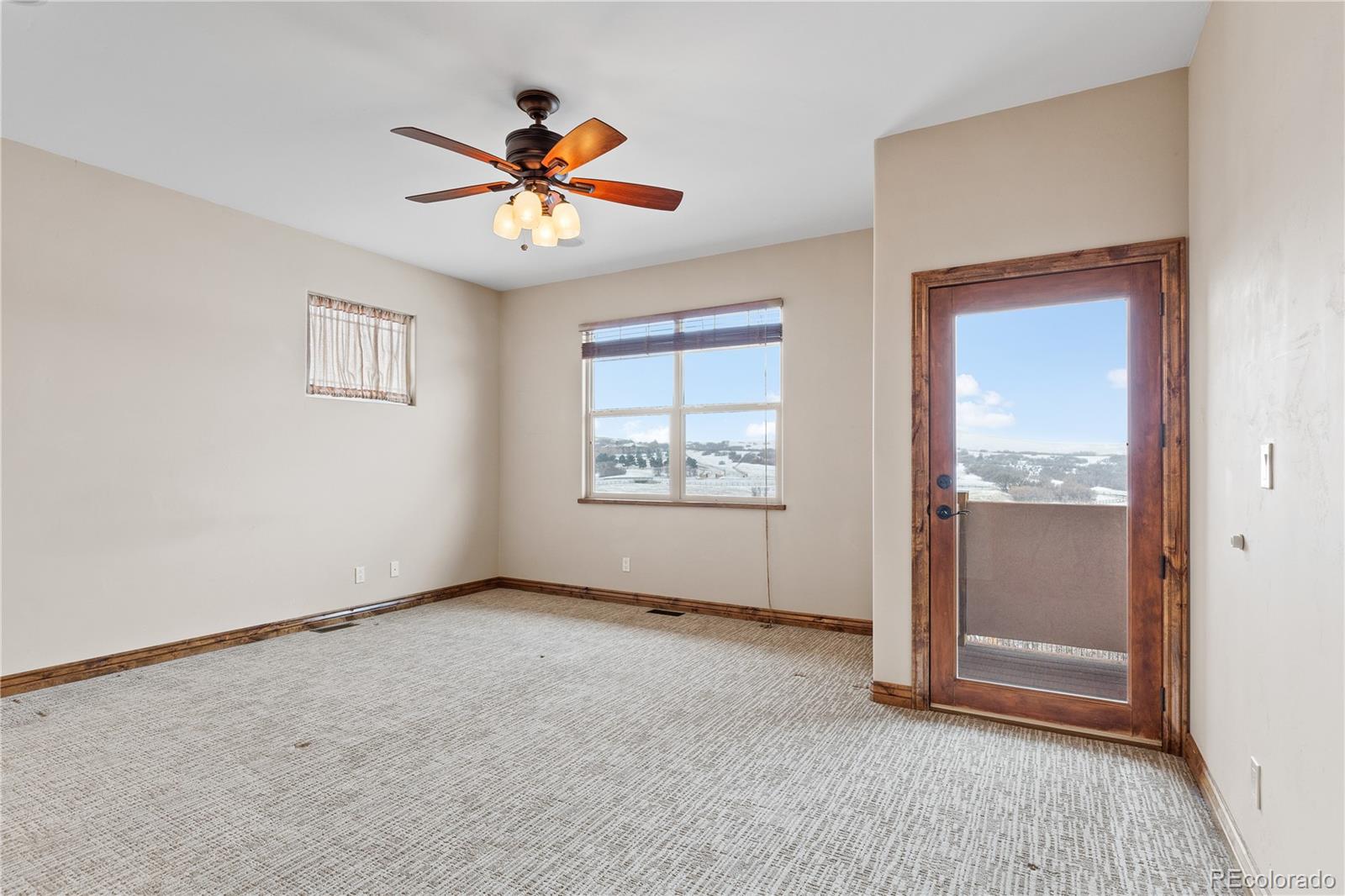 2505 Big Bear Circle Sedalia, CO 80135 - Photo 26 of 49 a view of an empty room with a window