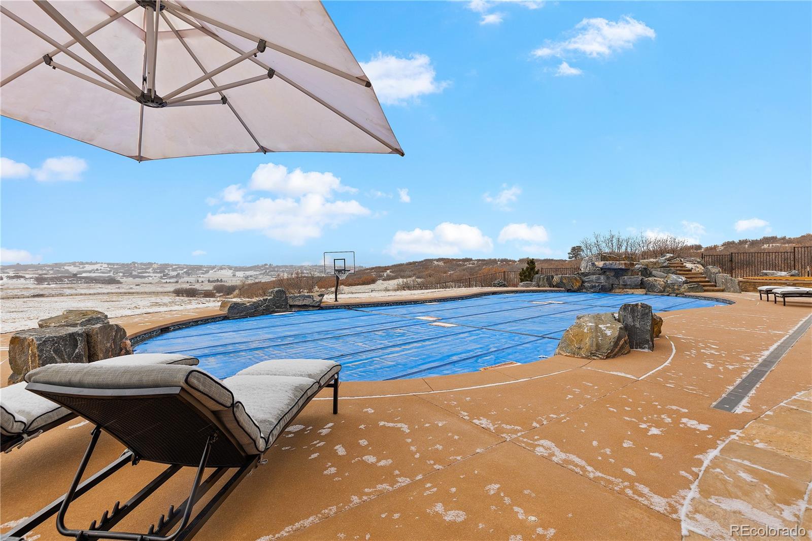 2505 Big Bear Circle Sedalia, CO 80135 - Photo 42 of 49 a view of a terrace with chairs