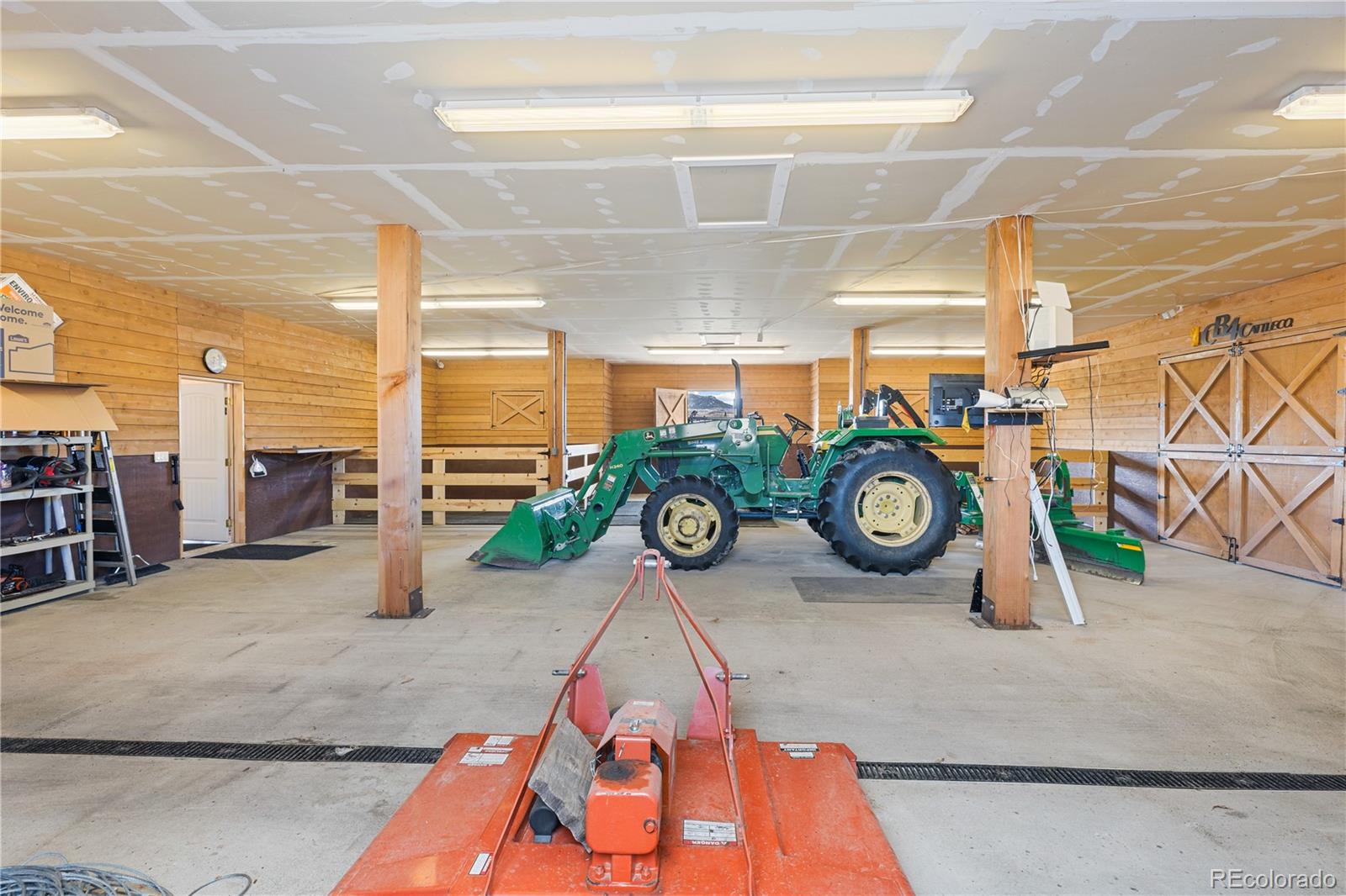 2505 Big Bear Circle Sedalia, CO 80135 - Photo 46 of 49 an empty room with gym equipment