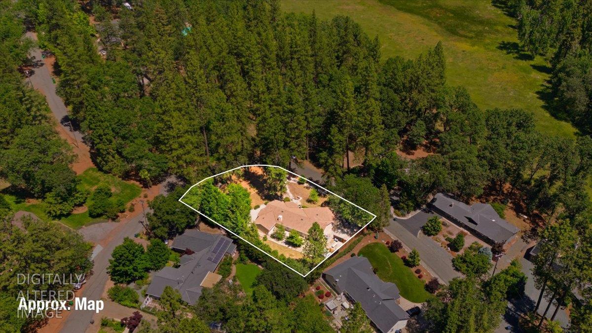 12600 Friar Tuck Road Grass Valley, CA 95949 - Photo 55 of 56 an aerial view of a house with a yard and lake view
