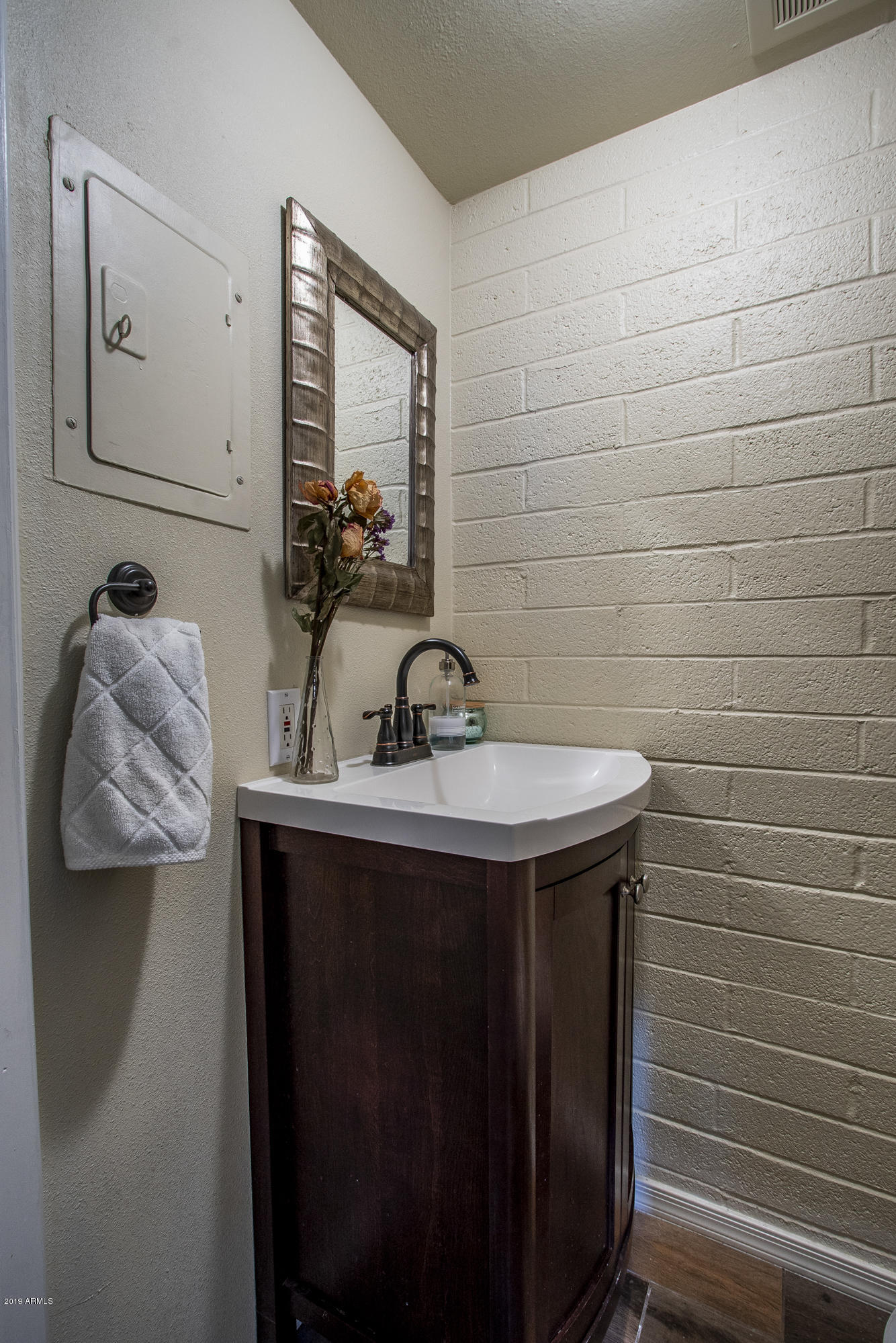 1029 North Granite Reef Road Scottsdale, AZ 85257 - Photo 12 of 22 Downstairs powder room