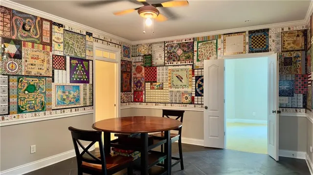 a living room with furniture and a shower