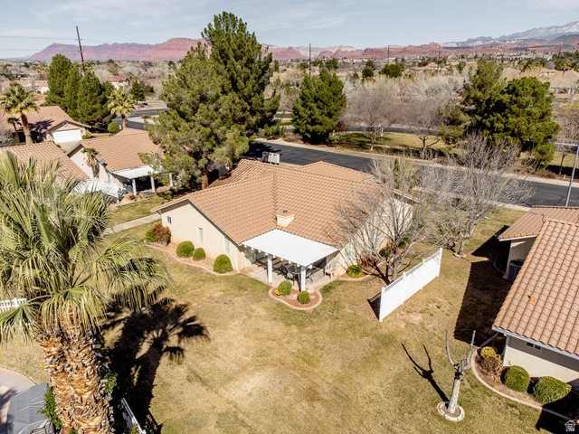 1825 West Mathis Park Place, Unit 46 St. George, UT 84770 - Photo 7 of 45 Aerial perspective of suburban area with mountains