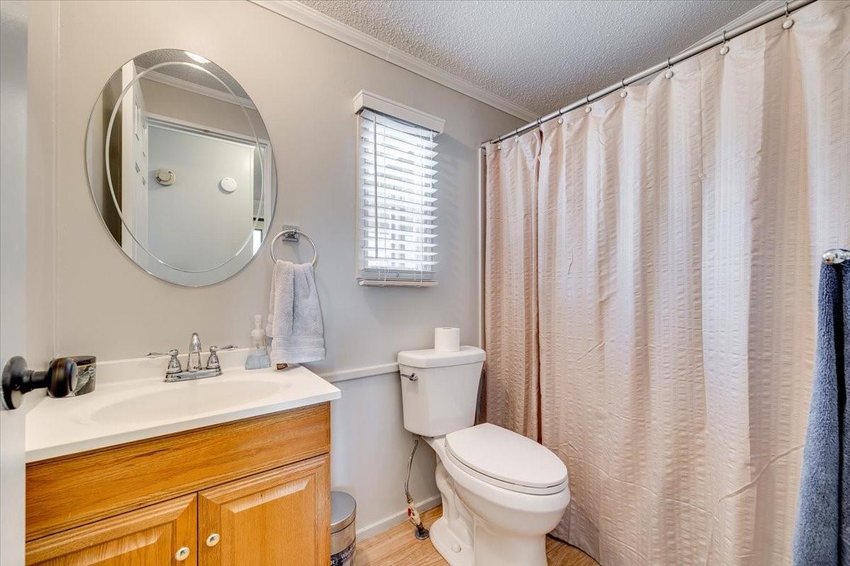 1230 Stateline Road Lake Wylie, SC 29710 - Photo 14 of 25 a bathroom with a sink toilet and mirror