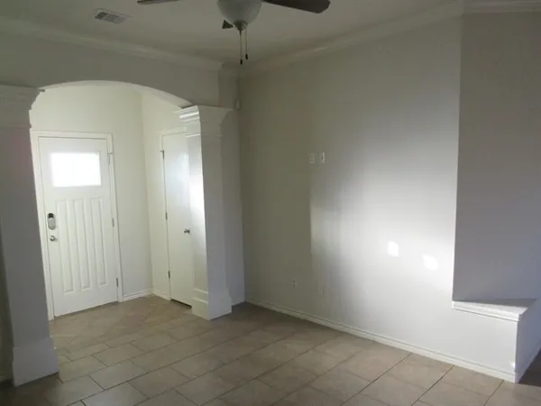 a view of a room with a window