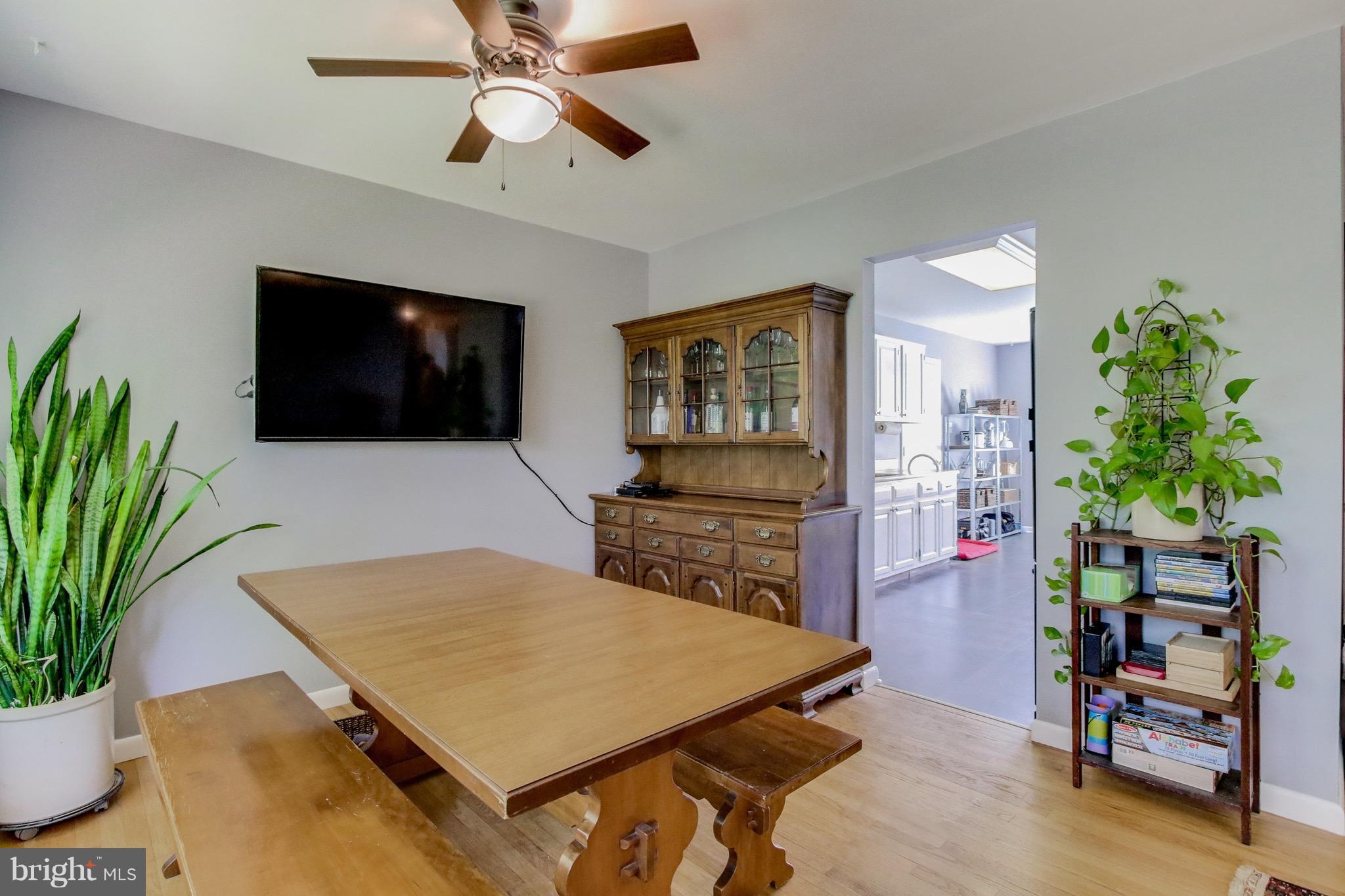 2412 Raintree Avenue Westminster, MD 21157 - Photo 14 of 30 a living room with furniture and a flat screen tv