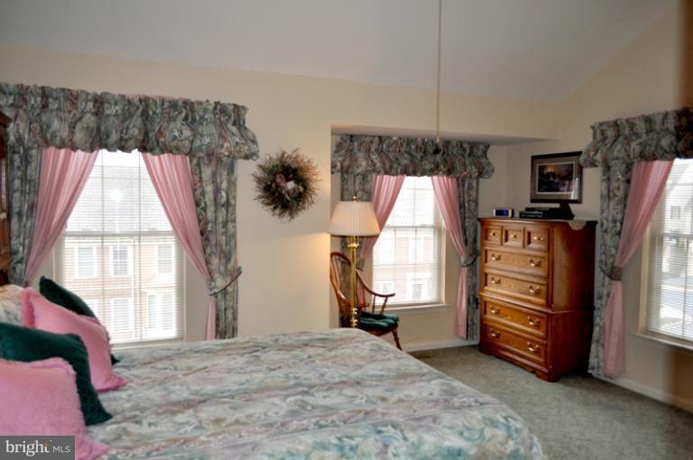 2233 Bear Den Road Frederick, MD 21701 - Photo 14 of 30 a bed room with a bed and a window