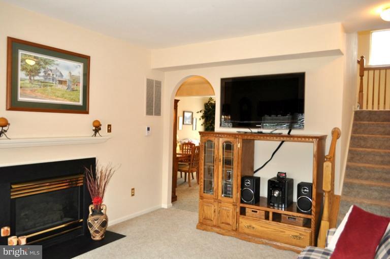 2233 Bear Den Road Frederick, MD 21701 - Photo 3 of 30 a view of a livingroom with furniture and a flat screen tv