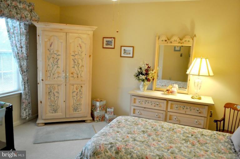 2233 Bear Den Road Frederick, MD 21701 - Photo 8 of 30 a spacious bathroom with a granite countertop sink and a mirror