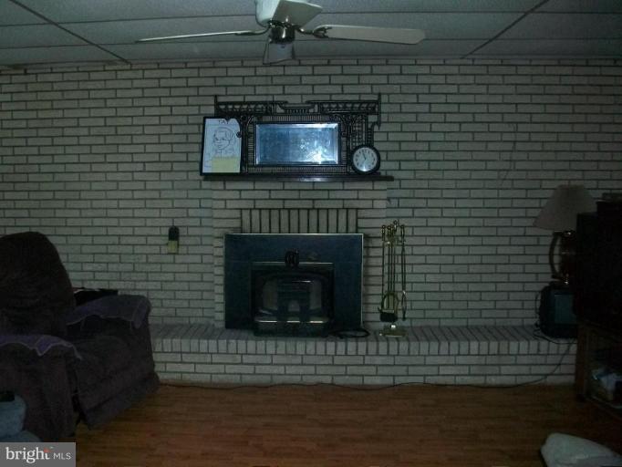 48420 Mattapany Road Lexington Park, MD 20653 - Photo 5 of 7 a brick oven with a fireplace