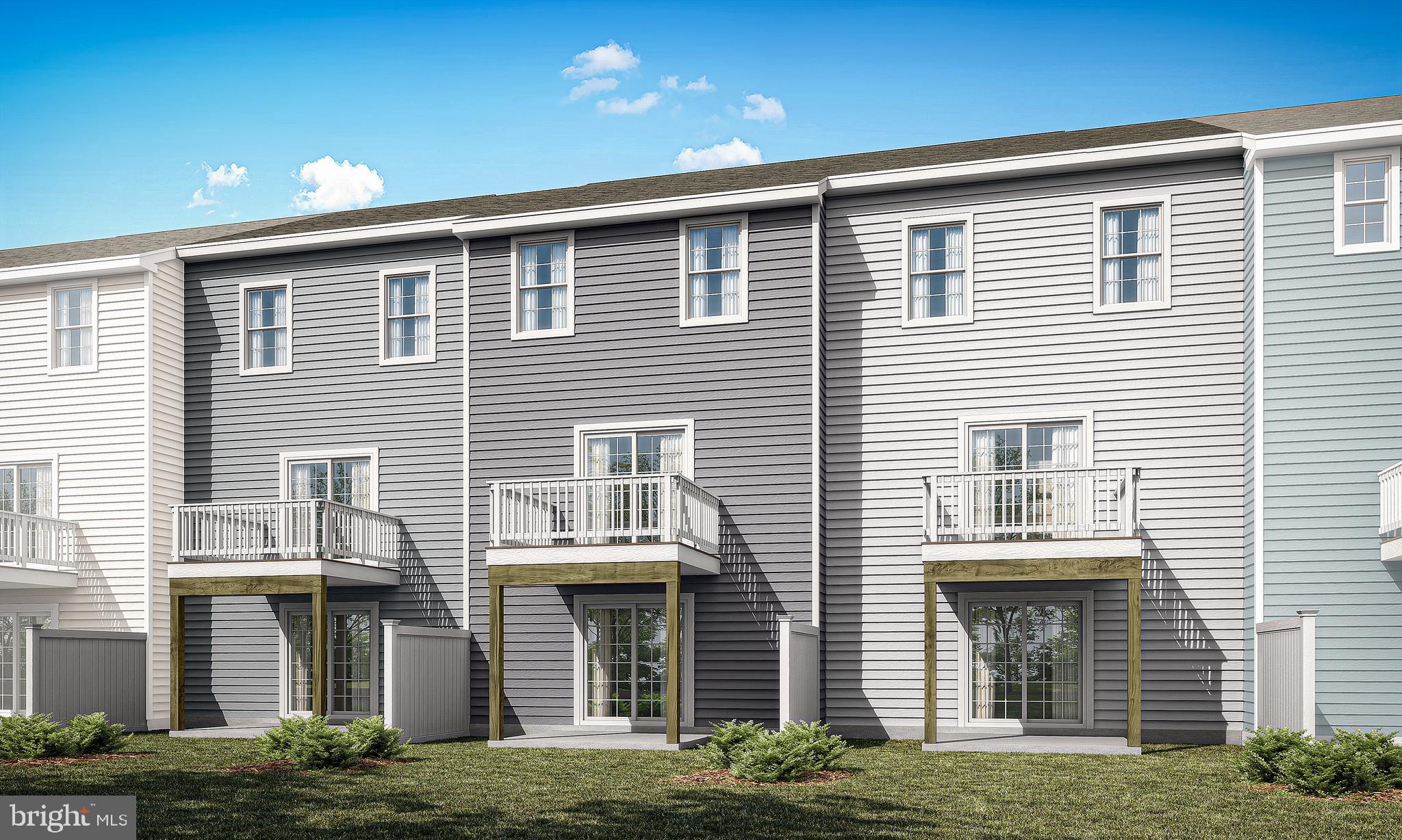 4 Little Pond Drive Laurel Springs, NJ 08021 - Photo 2 of 11 a front view of a house with a garden