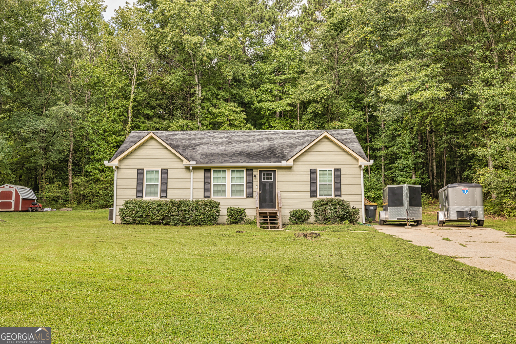 80 Prestigious Place Senoia, GA 30276 - Photo 1 of 19 a front view of a house with a yard