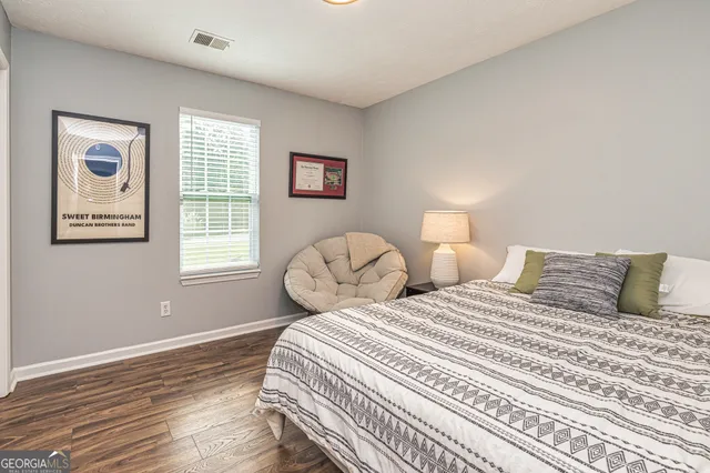 a view of a room that has a window and storage