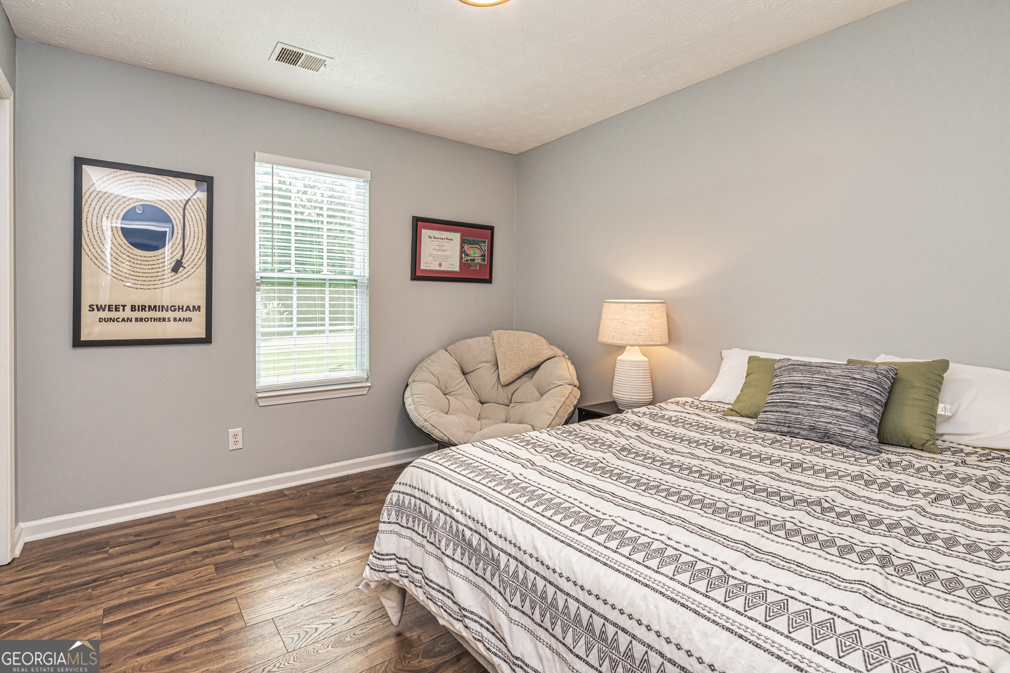 80 Prestigious Place Senoia, GA 30276 - Photo 18 of 19 a bedroom with two beds and a window