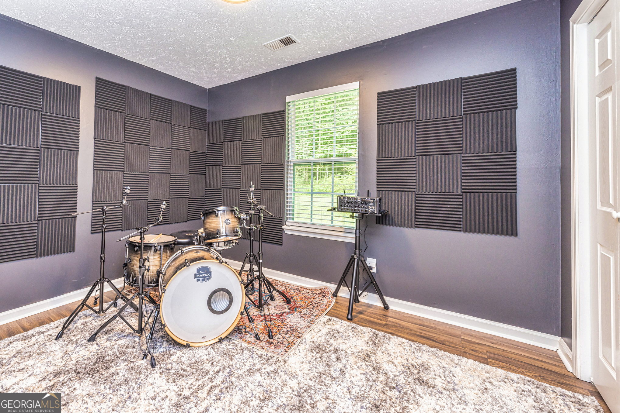 80 Prestigious Place Senoia, GA 30276 - Photo 19 of 19 a view of a room that has a window and storage