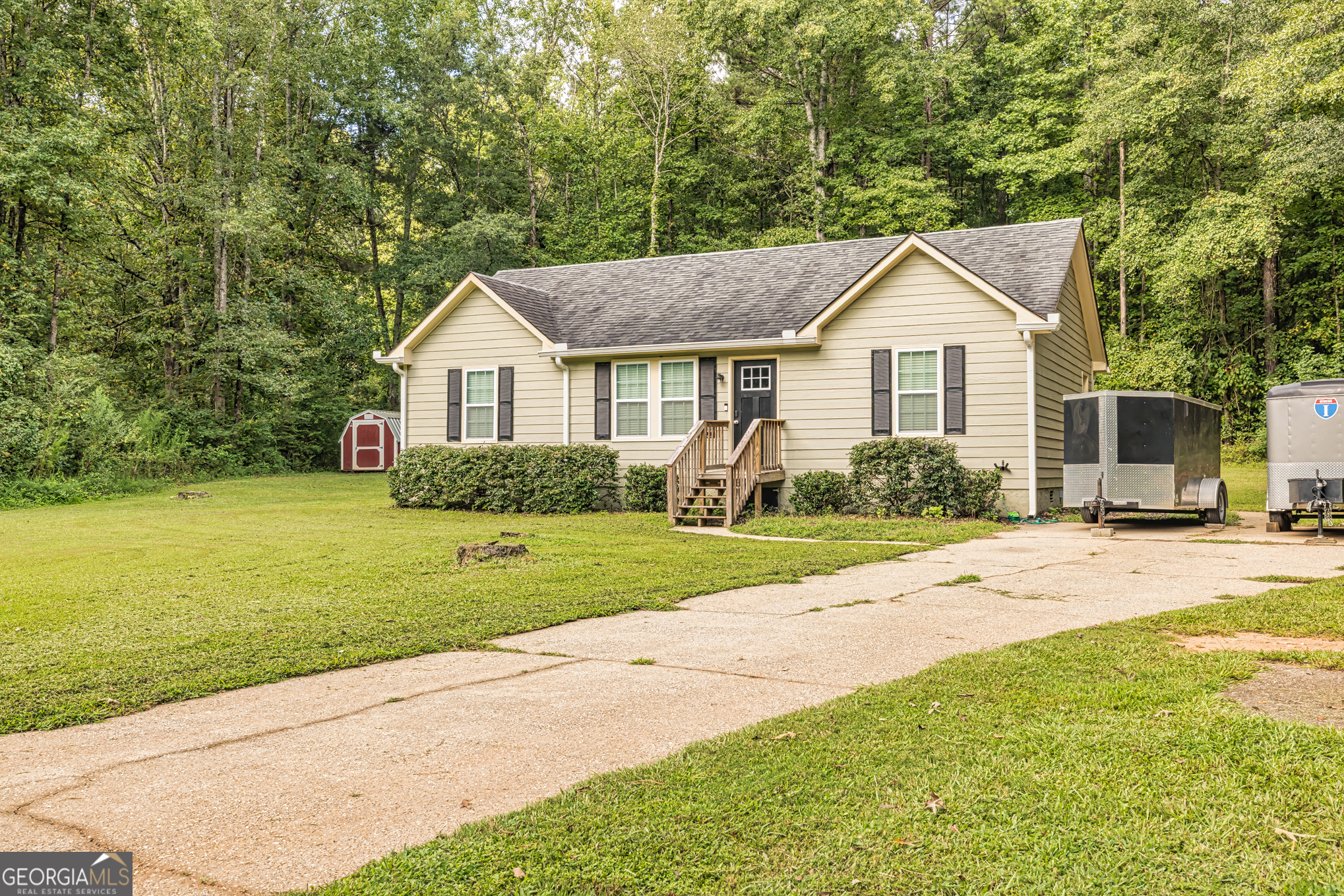 80 Prestigious Place Senoia, GA 30276 - Photo 2 of 19 a front view of house with yard and green space