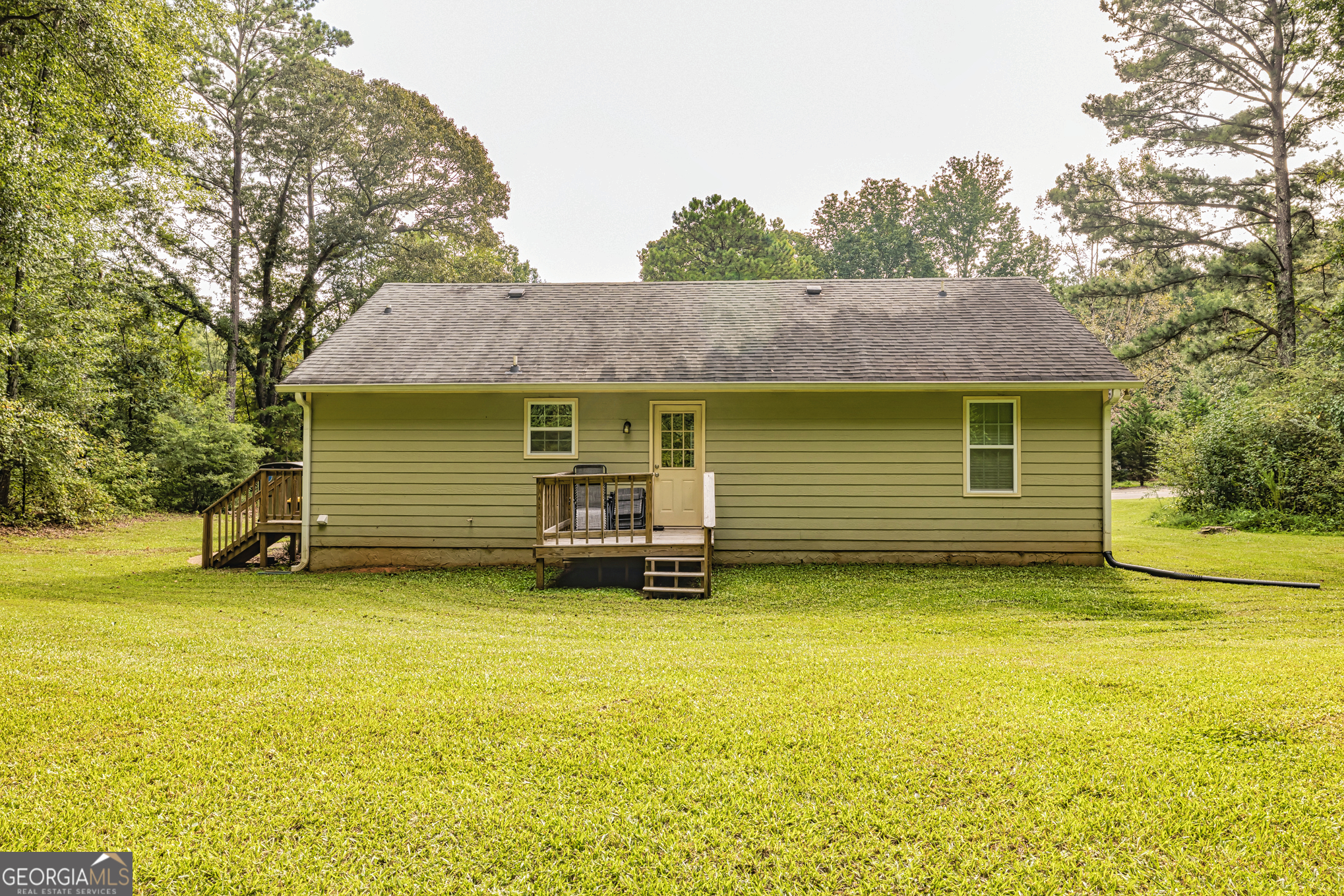 80 Prestigious Place Senoia, GA 30276 - Photo 5 of 19 a view of a house with a garden
