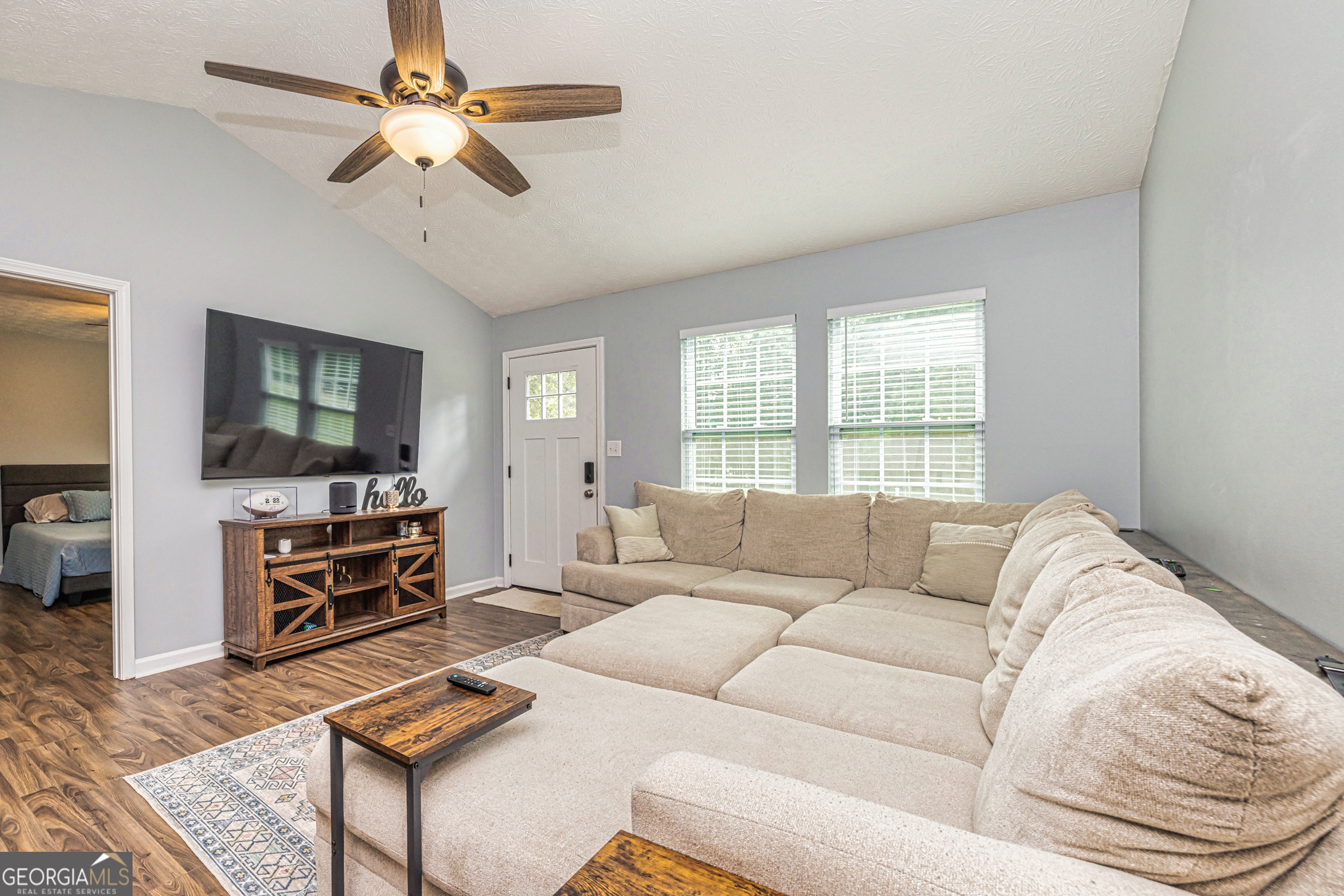 80 Prestigious Place Senoia, GA 30276 - Photo 7 of 19 a living room with furniture and a flat screen tv