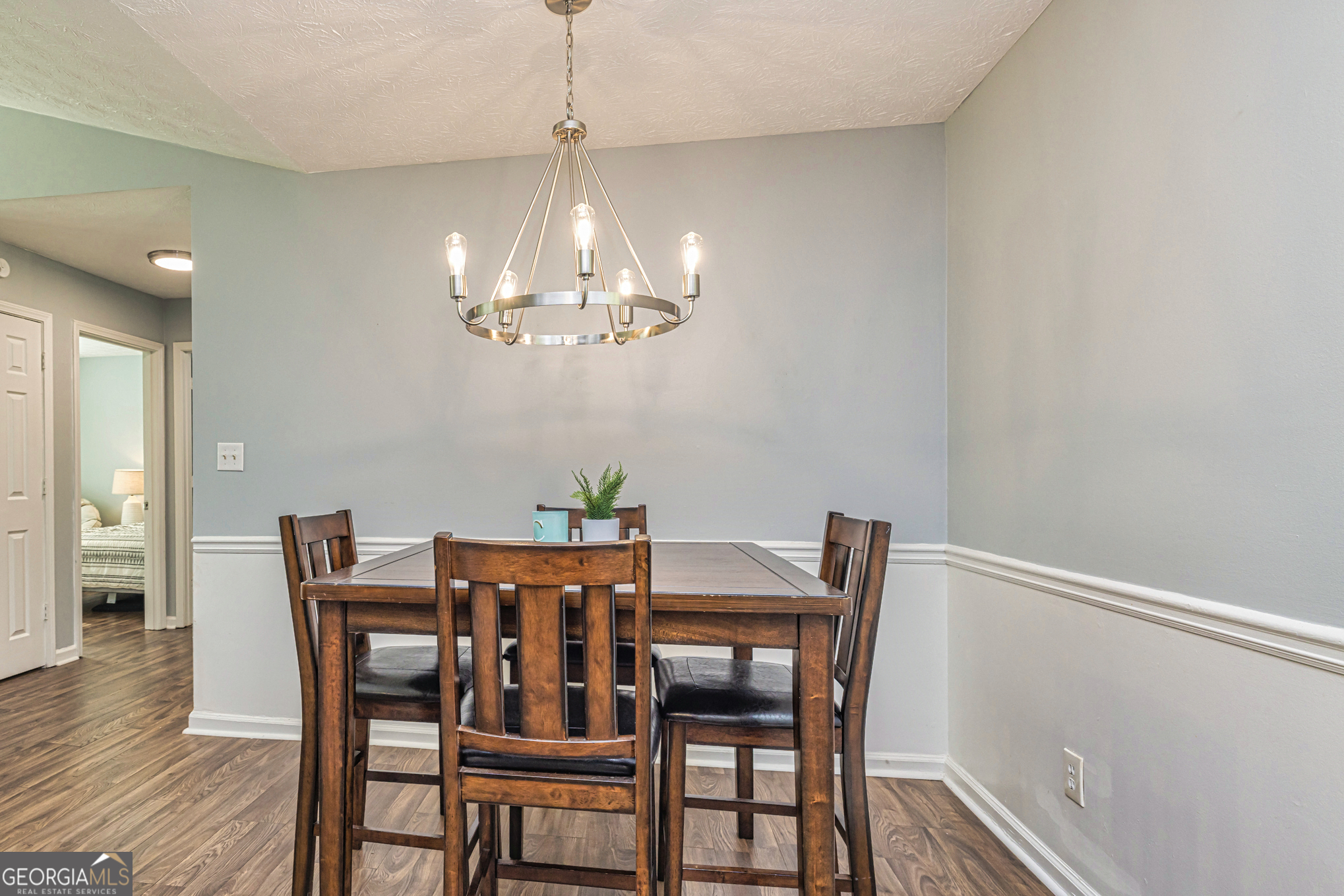 80 Prestigious Place Senoia, GA 30276 - Photo 10 of 19 a view of a dining room with furniture and chandelier